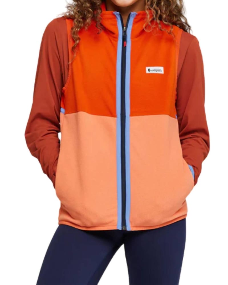 Front of a model wearing a size L Amado Fleece Vest in Canyon/Nectar in Canyon/Nectar by cotopaxi. | dia_product_style_image_id:363185